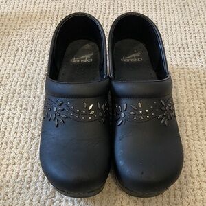 Dansko Black Leather Patricia Clogs with Metal Floral Details- EU 40